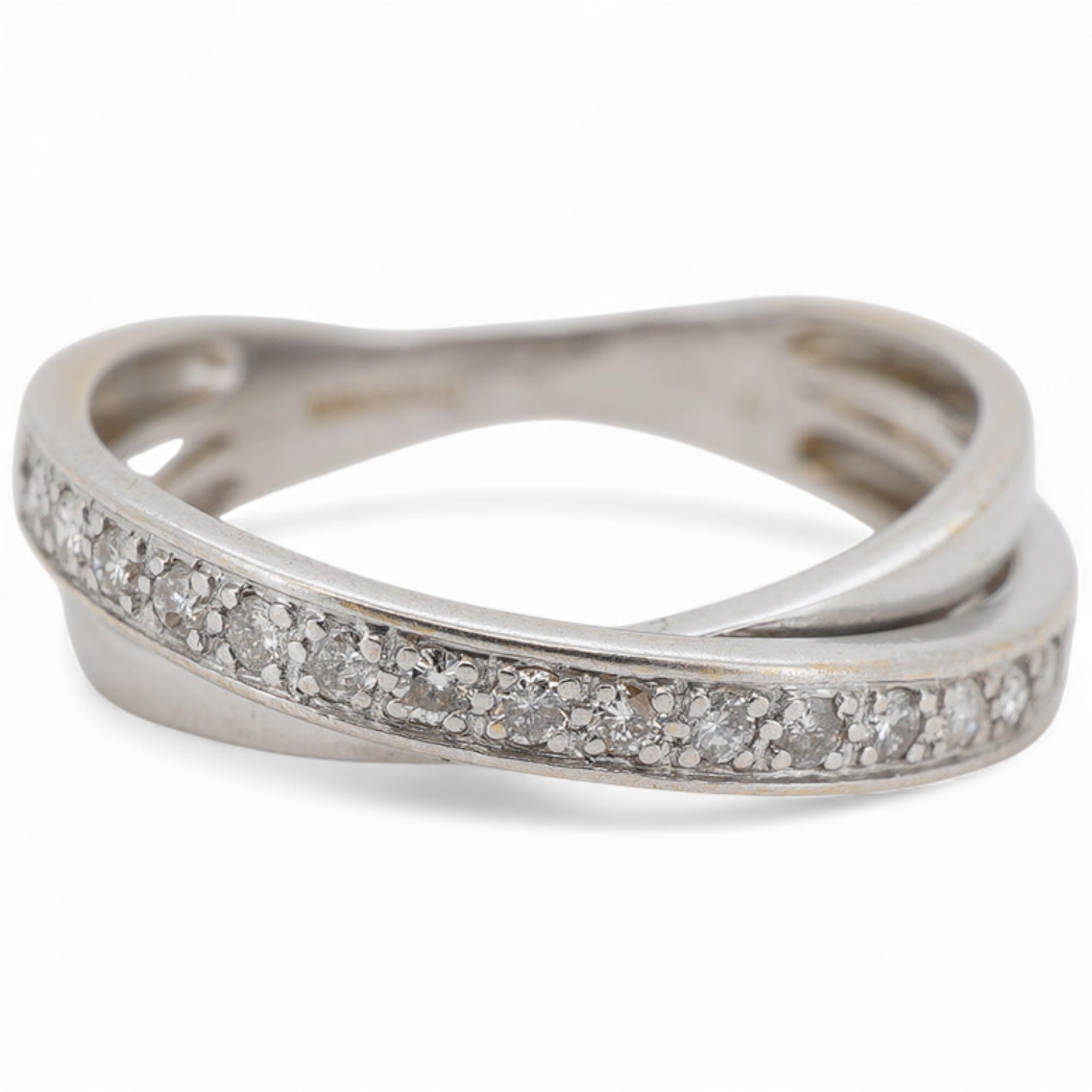 A recent 18ct white gold and diamond set twin band crossover ring, size L, gross weight 3.5 grams.